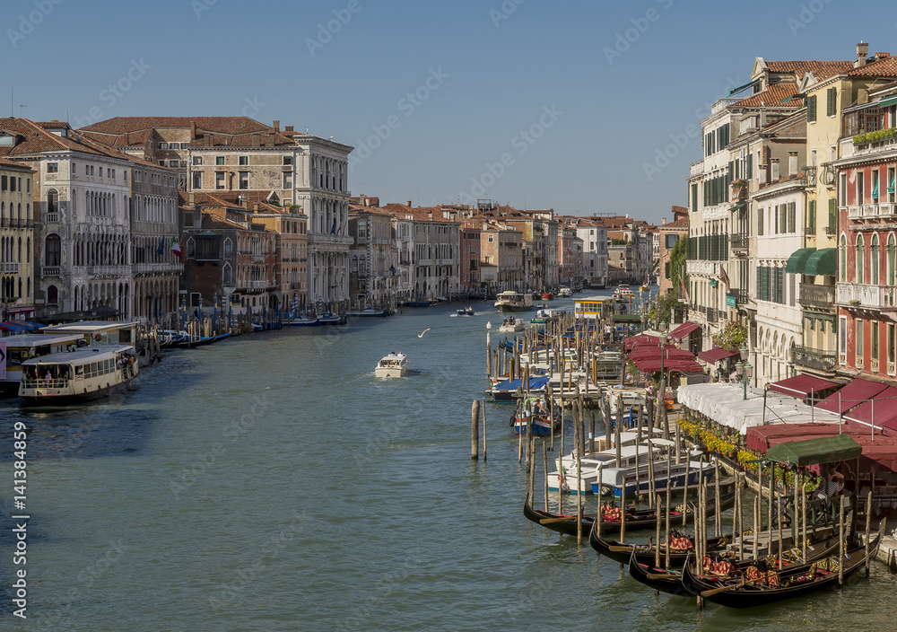 Stunning aerial view of the Grand Canal from the Rialto bridge on a sunny summer day, Venice, Italy