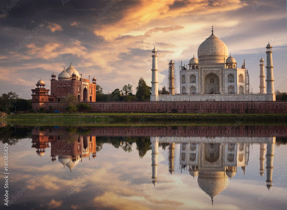 Taj Mahal at sunset as seen from Mehtab Bagh on the banks of the river Yamuna at Agra. Taj Mahal designated as a World Heritage Site is a masterpiece of Indian heritage and architecture.