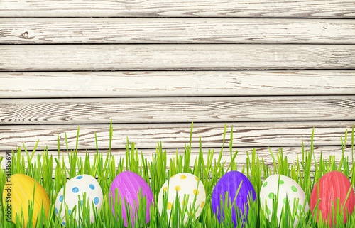 Easter eggs and grass borde...