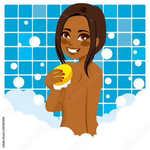 African American happy woman bathing with sponge and lots of bubble foam