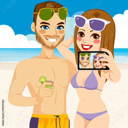 Young couple taking selfie ...