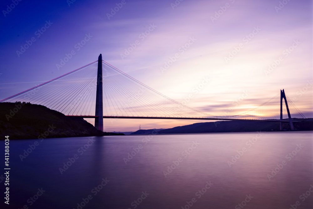 long exposure shot on yavuz sultan selim bridge at sunset long exposure shot on yavuz sultan selim bridge at sunset