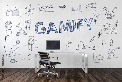 GAMIFY | Desk in an office with symbols photo