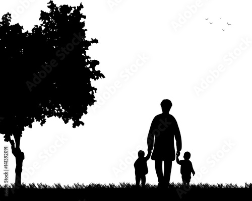 Grandmother walking with grandchildren in park, one in the series of similar images silhouette