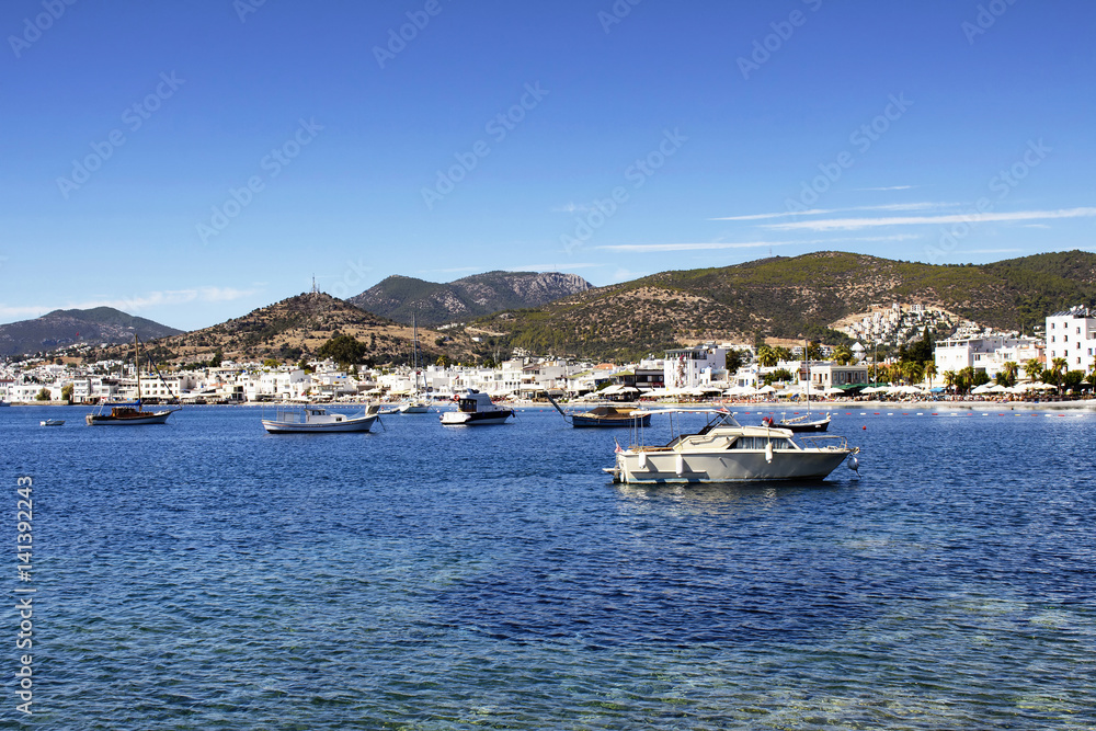 Luxury yachts, sailing and fishing boats in Bodrum bay. It is a city on the Bodrum Peninsula, stretching from Turkey's southwest coast into the Aegean Sea.