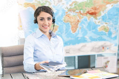 Foto Young Woman Travel Agent Concept