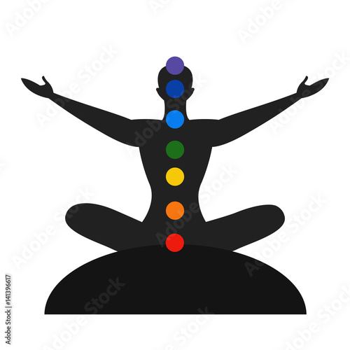 Silhouette of the meditate person with color the chakras, yoga person