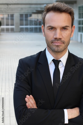 Handsome businessman smiling isolated