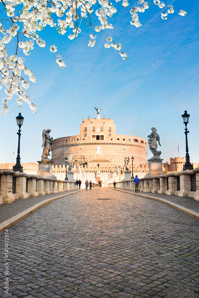 view of castle saint Angelo and brick bridge pavement at spring day, Rome, Italy
