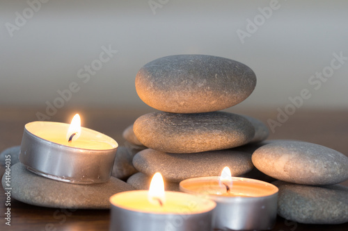 stack of stones balance and candles