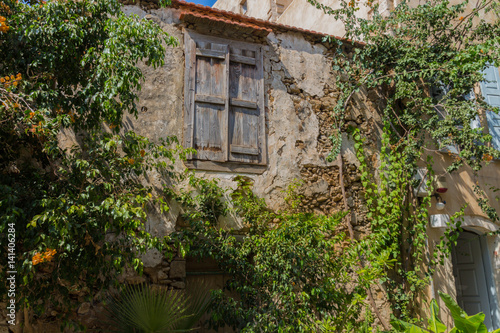 Rethymno, Greece - August 4, 2016: Ancient building and trees.