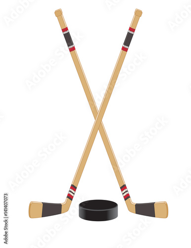 two hockey sticks crossed with puck isolated on a white background