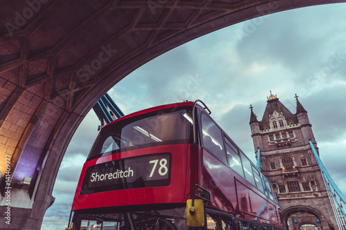 Fotografie London iconic Tower Bridge and double decker red bus