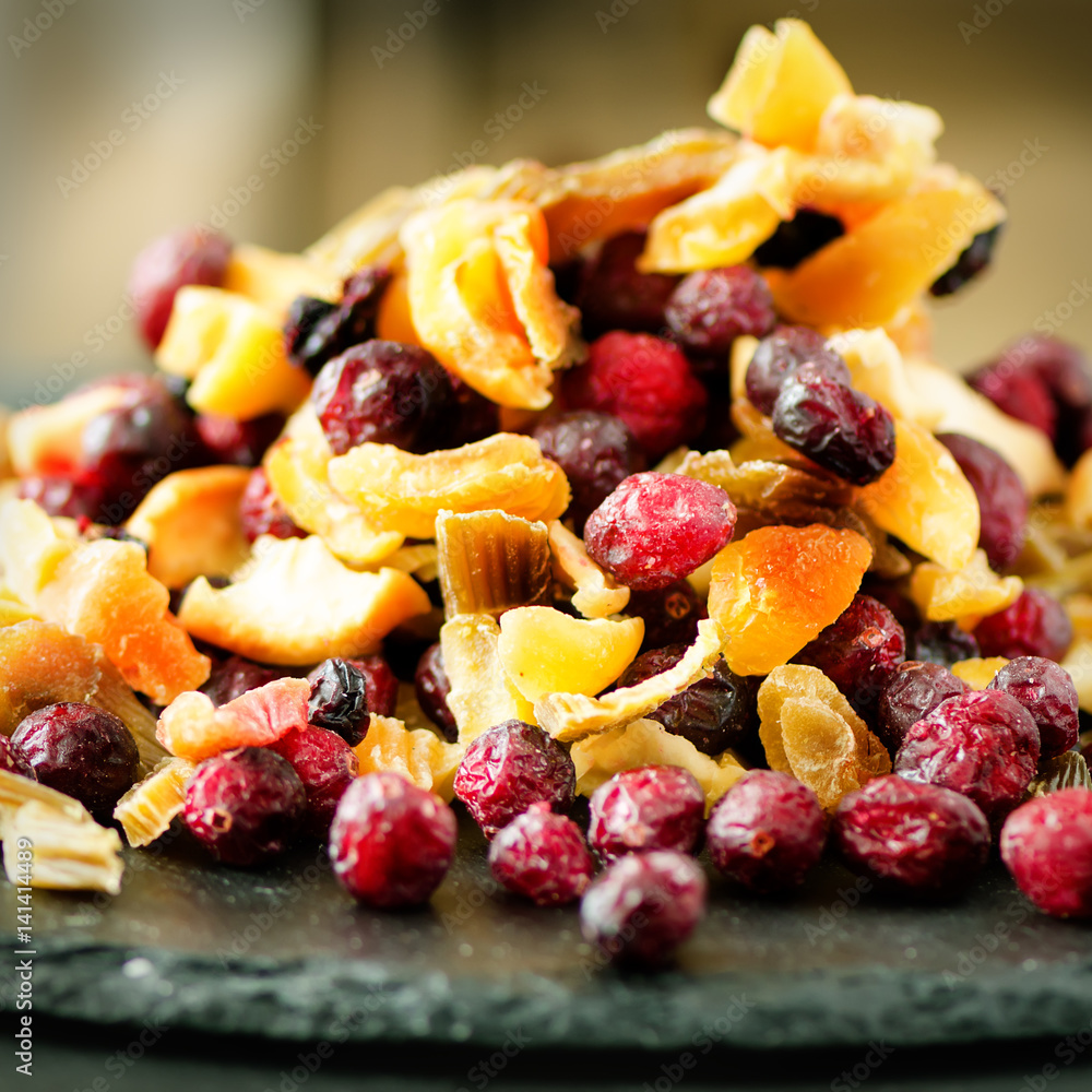 Mix of dried fruits on stone. Cranberry, rhubarb, apple, mango, cherry, peach, apricot. Handmade sweets no sugar. Healthy nutrition, high dose vitamin C. Mix of dried fruits on stone. Cranberry, rhubarb, apple, mango, cherry, peach, apricot. Handmade sweets no sugar. Healthy nutrition, high dose vitamin C.
