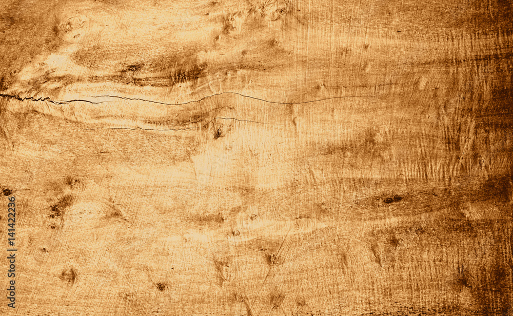Naklejka premium Rich flat wood texture with warm colors and burled finish. Rough wood surface with cut marks.