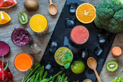 Detox diet. Healthy eating. Different colorful fresh juices, vegetables and fruits