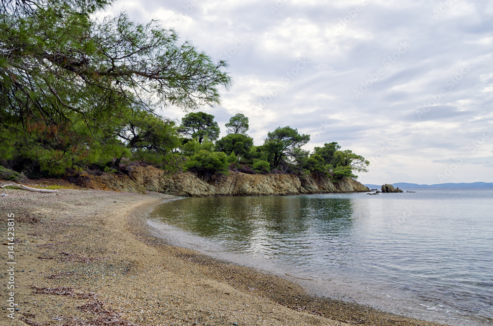 Gorgeous scenery by the sea under a cloudy sky in Sithonia, Chalkidiki, Greece 