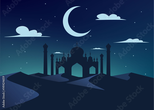 silhouette of mosque in night desert