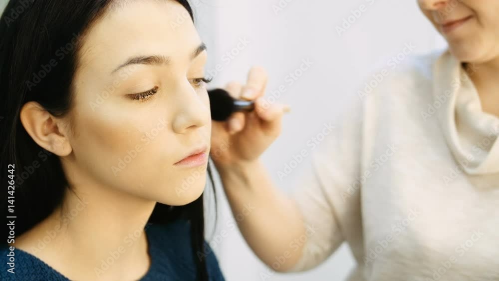Professional makeup mascara application with brush - work in beauty fashion industry cosmetics Professional makeup mascara application with brush - work in beauty fashion industry cosmetics