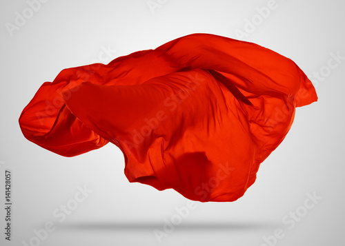 Smooth elegant red cloth on gray background