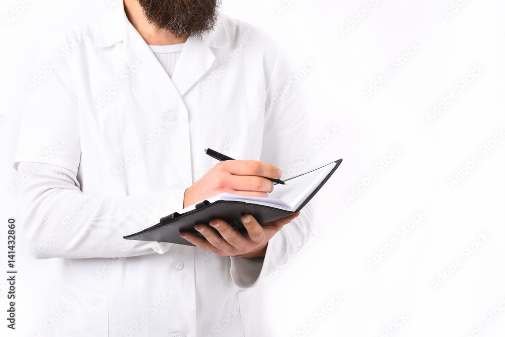 Male hands of caucasian doctor or postgraduate student with notebok Male hands of caucasian doctor or postgraduate student with notebok