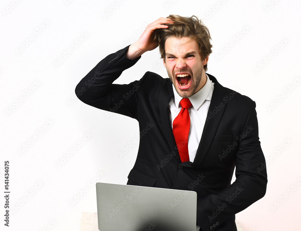 Caucasian stylish business man holding laptop Caucasian stylish business man holding laptop