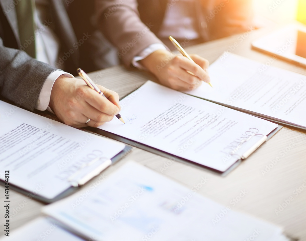 Business young people in the job interview, signed an employment contract with boss in office Business young people in the job interview, signed an employment contract with boss in office
