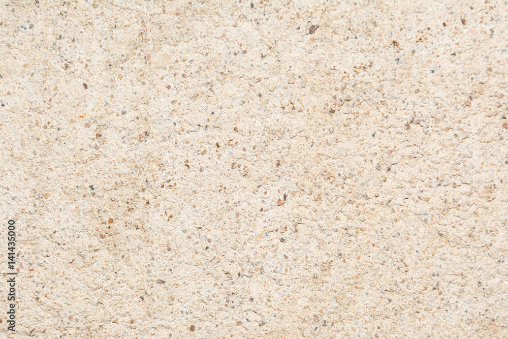 Texture of the structure of the concrete surface with fractions of small stones close-up Texture of the structure of the concrete surface with fractions of small stones close-up