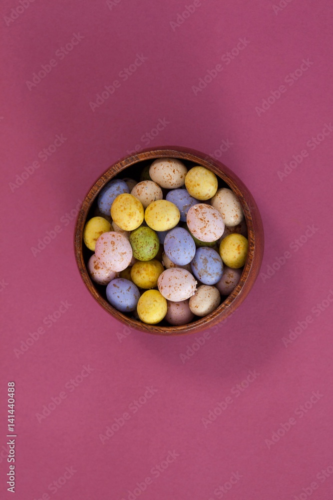 Colorful chocolate Easter eggs in a bowl Colorful chocolate Easter eggs in a bowl