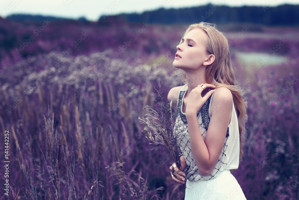 Beautiful romantic woman in the field. Beautiful romantic woman in the field.