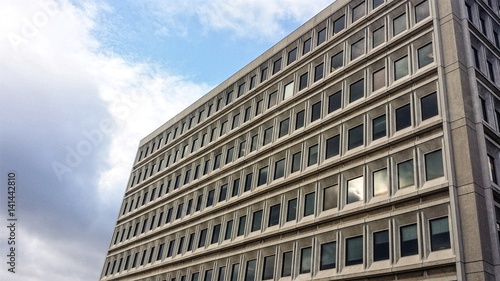 Blue sky and cloud reflection in modern highrise office building