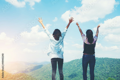 woman happy at mountain view for sun light