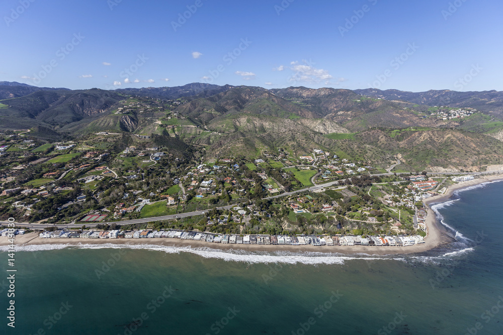 Aerial view of Malibu beaches, homes and the Santa Monica Mountains in Southern California. Aerial view of Malibu beaches, homes and the Santa Monica Mountains in Southern California.