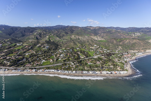 Aerial view of Malibu beaches, homes and the Santa Monica Mountains in Southern California. 