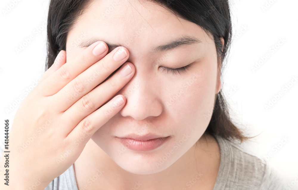 Woman hand closes eyes with eye pain, health care and medical concept Woman hand closes eyes with eye pain, health care and medical concept