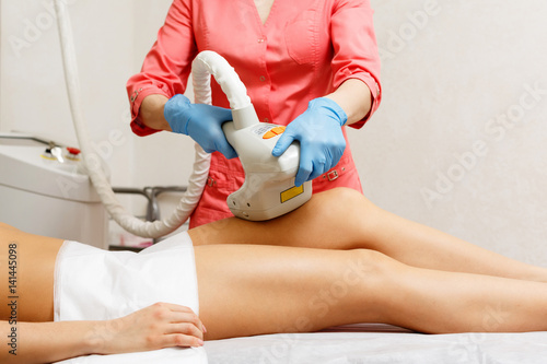 Vacuum anticellulite massage hip girl. Hardware cosmetology. Spa. Skin rejuvenation.
