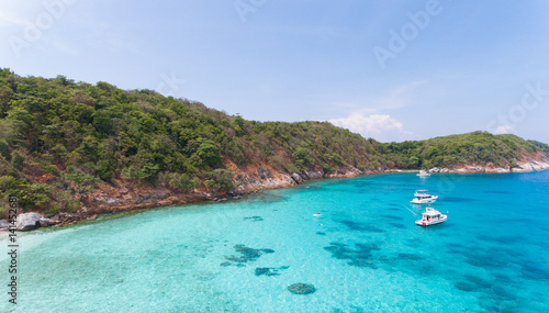 Blue water and Motor recreation boats on the tropical beach in the Racha Noi island Thailand © wanchai