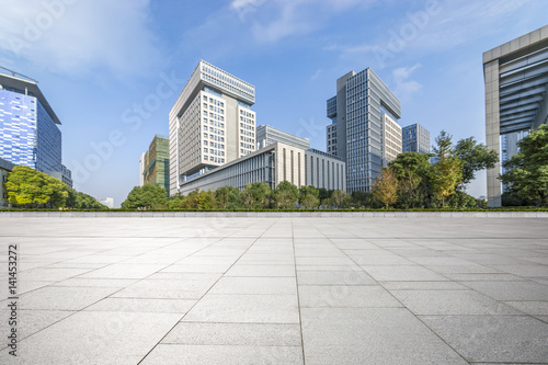 Empty floor with modern business office building © MyCreative