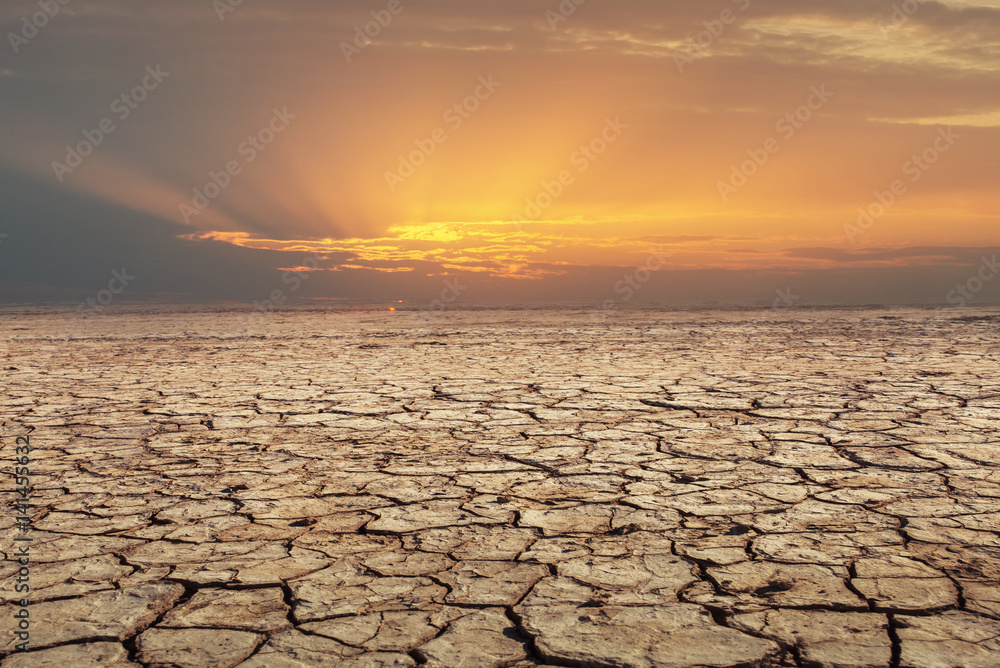 Soil drought cracked landscape sunset Soil drought cracked landscape sunset