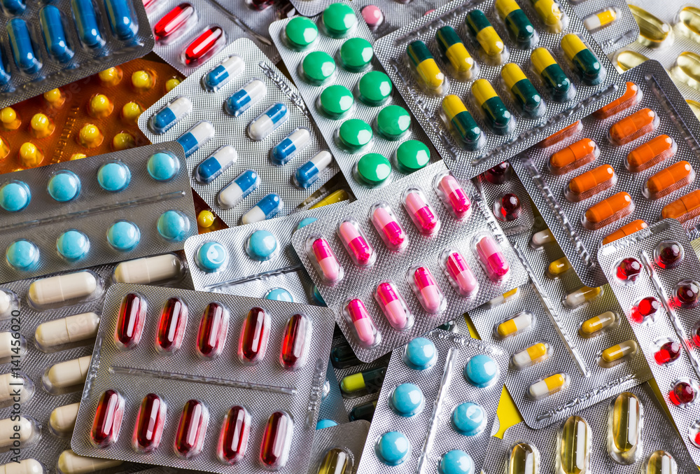 Selection of different pills in form of tablets and capsules Selection of different pills in form of tablets and capsules