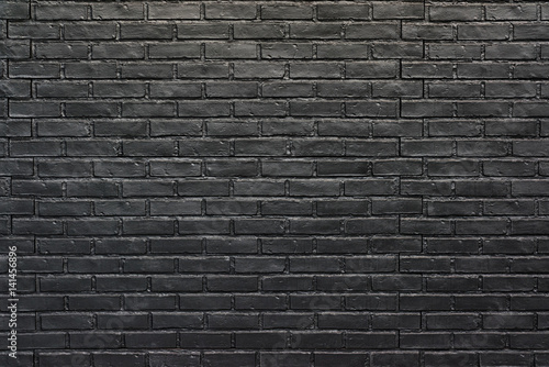 Black brick wall for background, painted brick