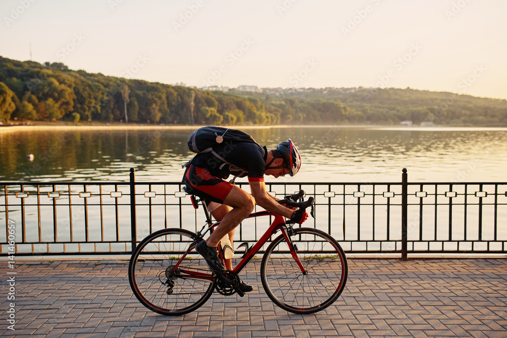 Fototapeta premium Young and energetic cyclist in the park