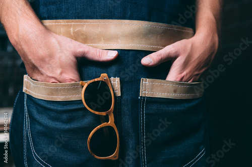 Male hands in apron