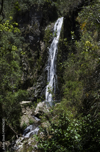 Natural waterfall in Dominican Republic named Las Aguas Blancas, Constanza, summer day © evashchilko