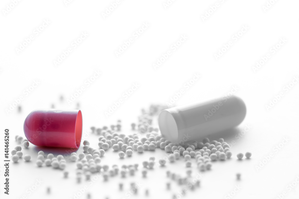 Medical,pharmacy theme background concept.Dark red capsules. Medical,pharmacy theme background concept.Dark red capsules.