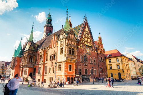 Colorful morning scene on Wroclaw Market Square with Town Hall