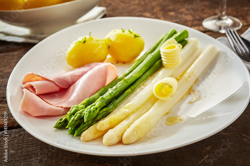Serving of gourmet green and white asparagus