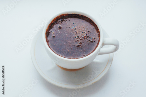 coffee cup over white background. The morning celebration
