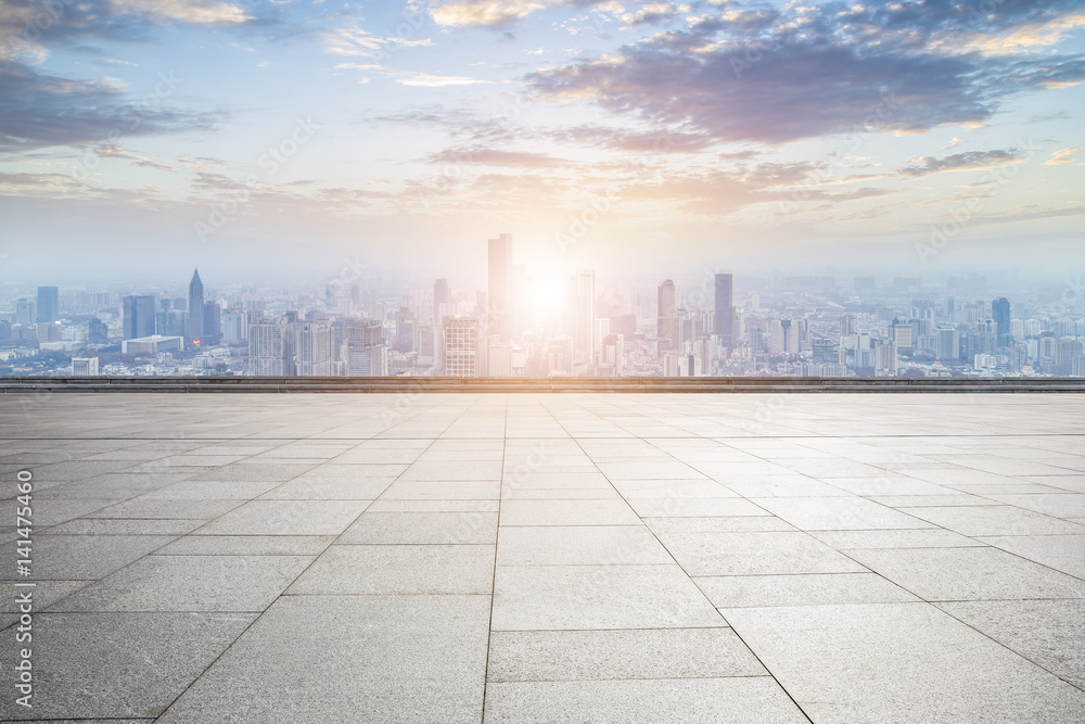 Panoramic skyline and buildings with empty concrete square floor Panoramic skyline and buildings with empty concrete square floor