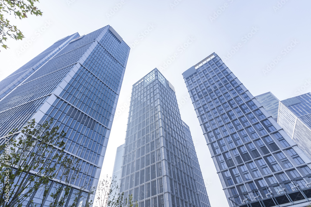 Cityscape office buildings with modern corporate architecture - business and success concept